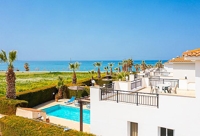 Upper terrace area with sea views . - Villa Dalia . (Photo Gallery) }}