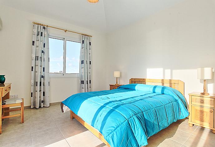 Double bedroom with A/C and balcony access . - Villa Dalia . (Photo Gallery) }}