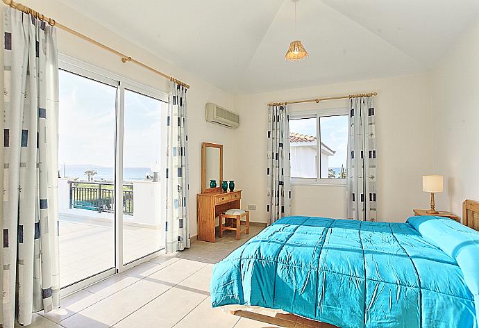 Double bedroom with A/C and balcony access . - Villa Dalia . (Photo Gallery) }}