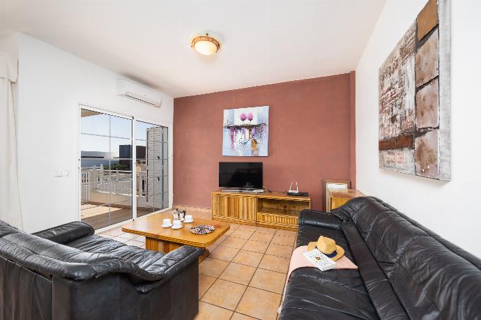 Living room with sofas, dining area, A/C, WiFi internet, and satellite TV . - Villa Gaida . (Photo Gallery) }}
