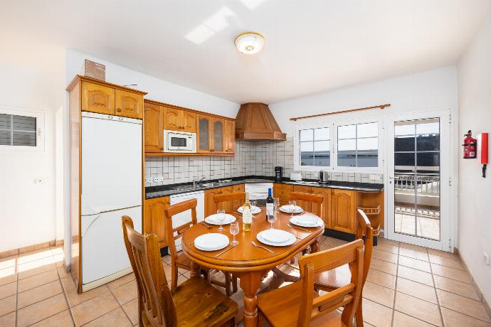Equipped kitchen with dining area . - Villa Gaida . (Photo Gallery) }}