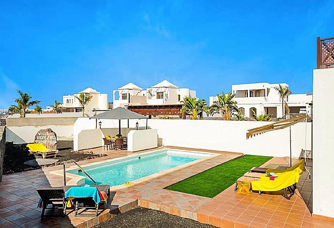 Private pool with terrace area . - Vista Faro . (Photo Gallery) }}