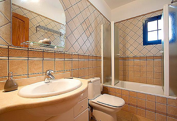 Bathroom with bath and shower . - Villa Tamia . (Photo Gallery) }}