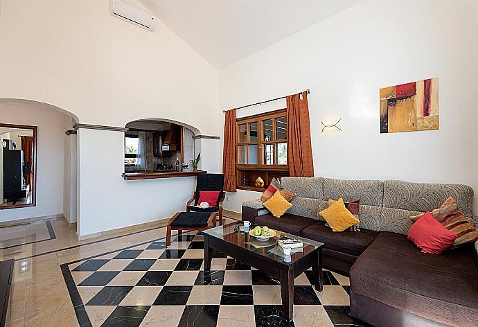 Living area with WiFi, TV, DVD player with terrace access . - Villa Calma . (Photo Gallery) }}