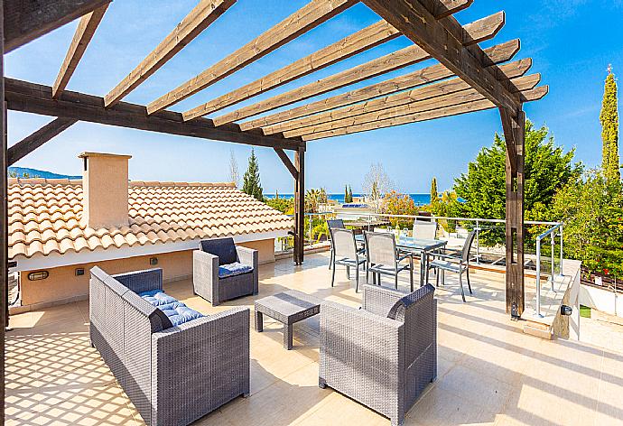 Upper terrace area with sea views . - Villa Thalassa . (Photo Gallery) }}