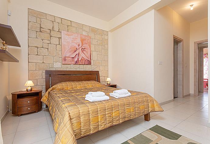 Double bedroom with en suite bathroom, A/C, and terrace access . - Villa Thalassa . (Photo Gallery) }}