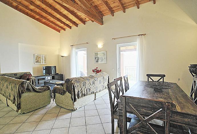 Living room with WiFi, TV and DVD player . - Villa Zeus Kerasia . (Photo Gallery) }}