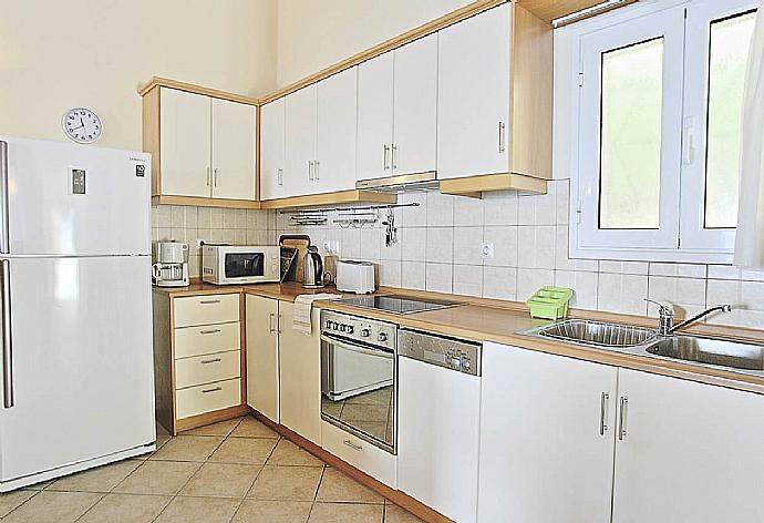 Fully equipped kitchen . - Villa Zeus Kerasia . (Photo Gallery) }}