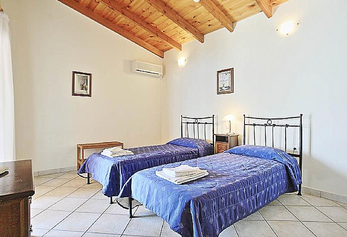 Twin bedroom with AC . - Villa Zeus Kerasia . (Photo Gallery) }}