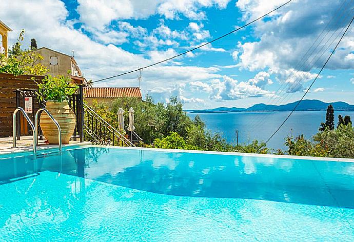 Private infinity pool and terrace with sea views . - Villa Katerina . (Photo Gallery) }}