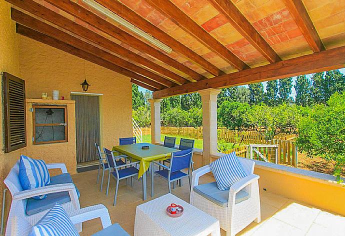 Covered terrace area . - Villa Roig . (Photo Gallery) }}