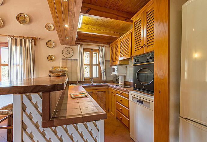 Equipped kitchen . - Villa Cal Cristo . (Galerie de photos) }}