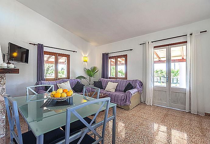 Living and dining area with WiFi, TV, DVD player and terrace access . - Villa Dionis . (Photo Gallery) }}