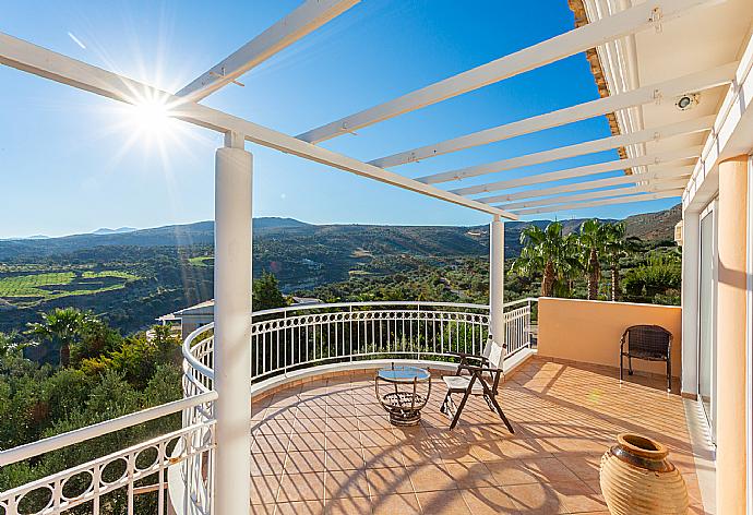 Balcony with countryside and sea views . - Villa Asimenia . (Photo Gallery) }}