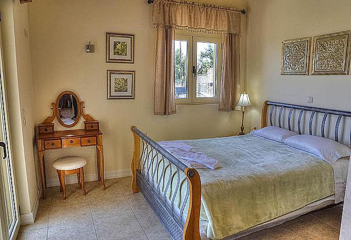 Double bedroom with A/C and balcony access . - Villa Fengari . (Photo Gallery) }}
