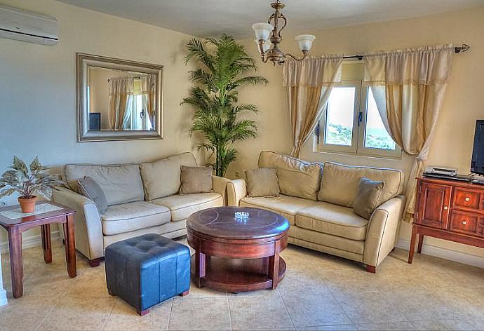 Living room with WiFi, TV, DVD player and terrace access . - Villa Fengari . (Photo Gallery) }}