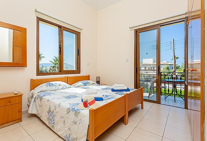 Twin bedroom with A/C and balcony . - Villa Halima Fostira . (Photo Gallery) }}