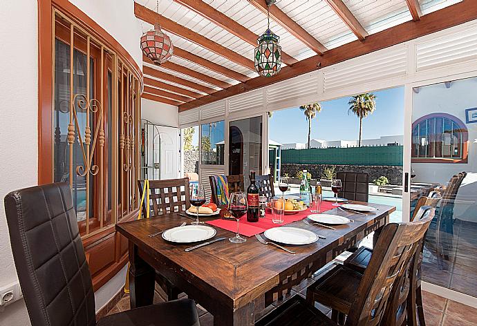 Dining area with terrace access . - Villa Palmira . (Photo Gallery) }}