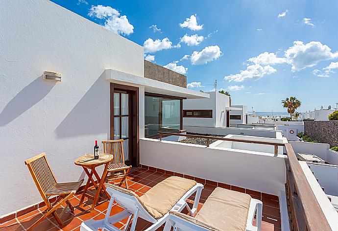 Upper terrace area with sea views . - Villa Julianne 4 . (Photo Gallery) }}