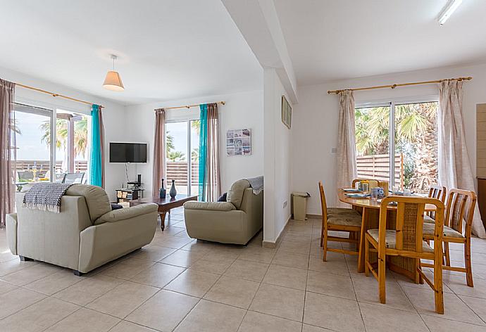 Living room with dining area  . - Villa Aspelia . (Photo Gallery) }}