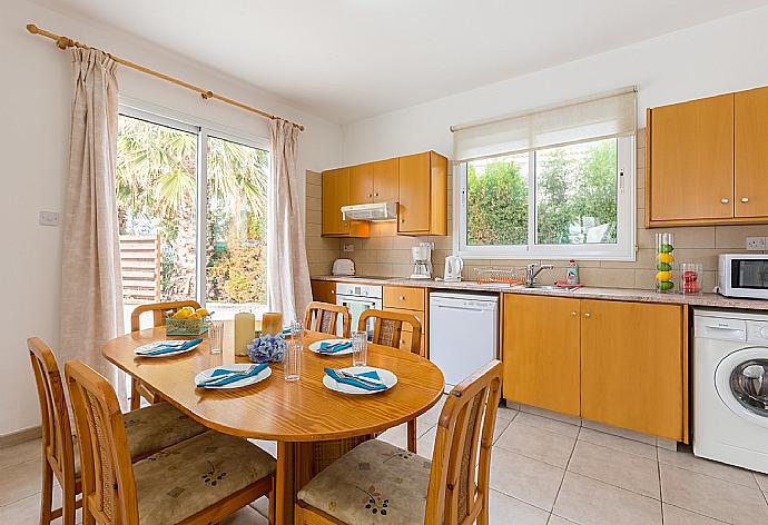 Equipped kitchen with dining area . - Villa Aspelia . (Photo Gallery) }}