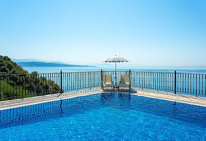 Private pool and terrace with panoramic sea views . - Villa Elpida . (Photo Gallery) }}