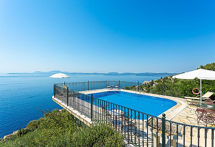 Private pool and terrace with panoramic sea views . - Villa Elpida . (Photo Gallery) }}