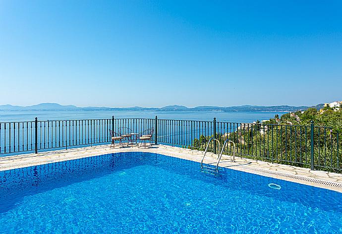 Private pool and terrace with panoramic sea views . - Villa Elpida . (Photo Gallery) }}