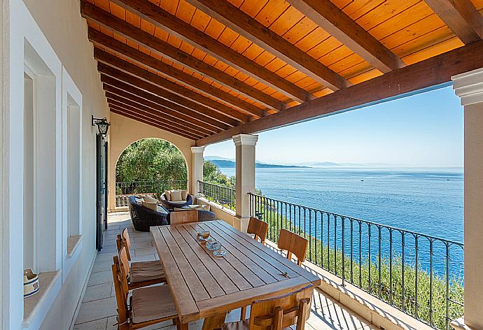 Sheltered terrace with panoramic sea views . - Villa Elpida . (Photo Gallery) }}