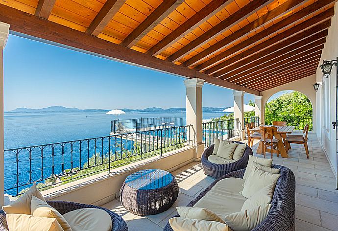 Sheltered terrace area with panoramic sea views . - Villa Elpida . (Photo Gallery) }}