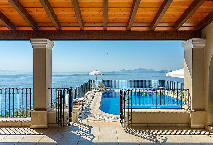 Sheltered terrace with panoramic sea views . - Villa Elpida . (Photo Gallery) }}