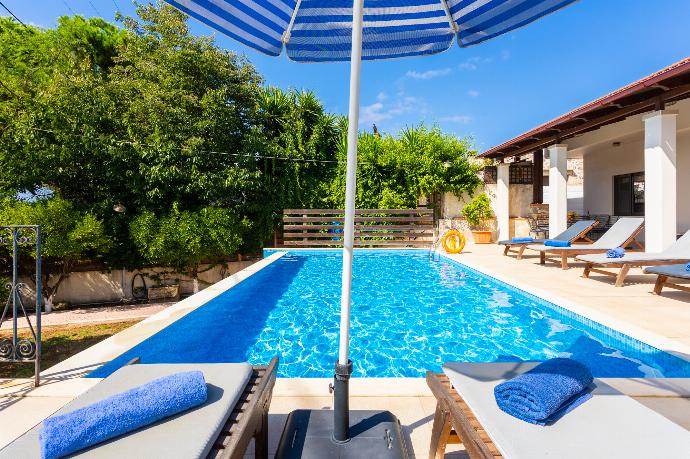 Private pool, terrace, and garden . - Villa Maro . (Galería de imágenes) }}