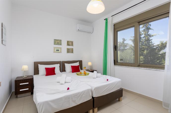 Twin bedroom with A/C . - Villa Arda . (Photo Gallery) }}