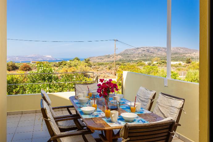 Terrace area with sea views . - Villa Litsa . (Photo Gallery) }}