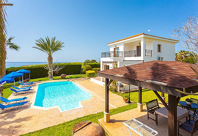 Private pool, terrace, and garden with panoramic sea views . - Villa Pelagos . (Photo Gallery) }}