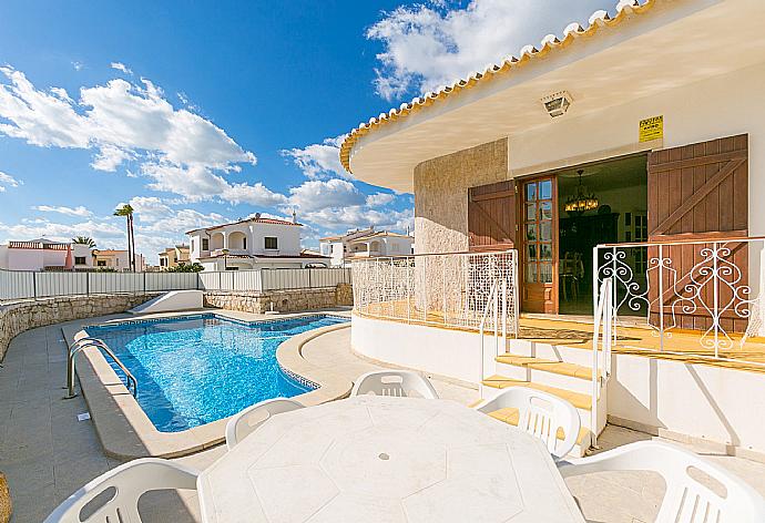 Pool area with sunbeds and outdoor table . - Brisa Do Mar . (Photo Gallery) }}