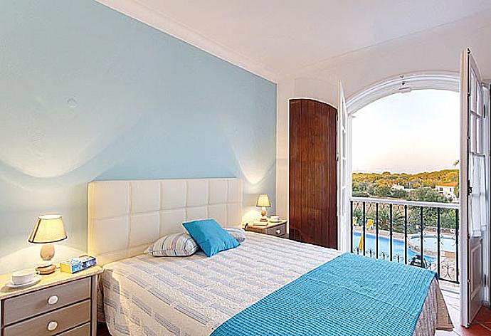 Double bedroom with balcony access . - Monte Branco . (Photo Gallery) }}