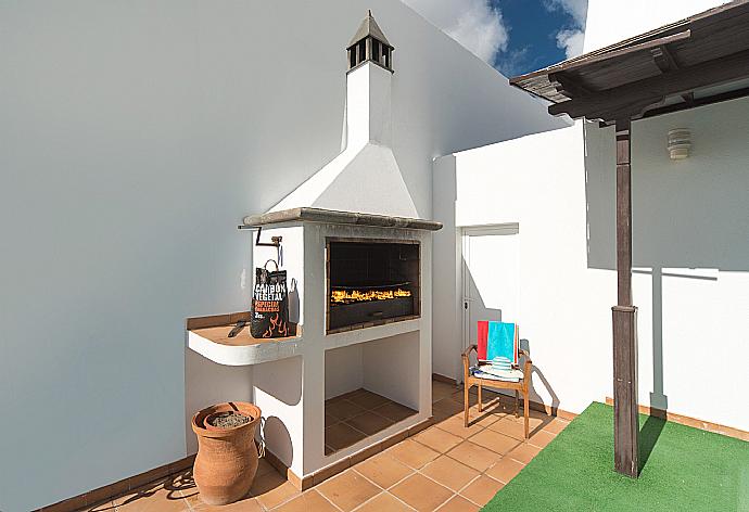 Terrace area with BBQ . - Villa Reyes . (Photo Gallery) }}