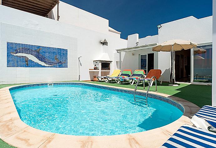 Private pool with terrace area . - Villa Reyes . (Photo Gallery) }}