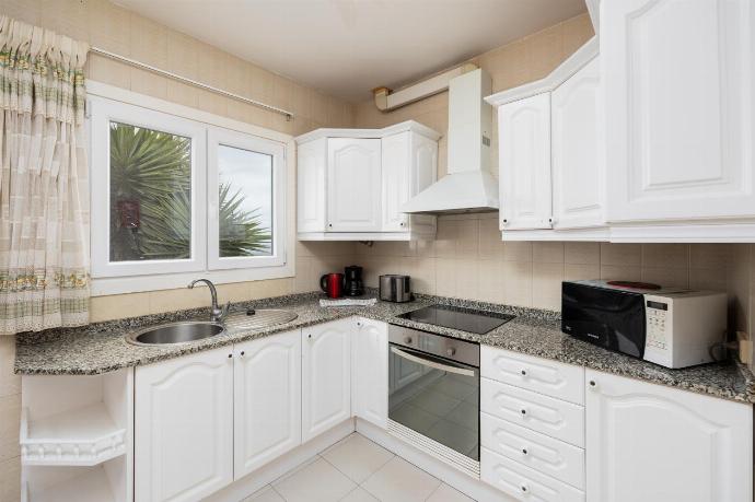 Equipped kitchen . - Villa Reyes . (Photo Gallery) }}