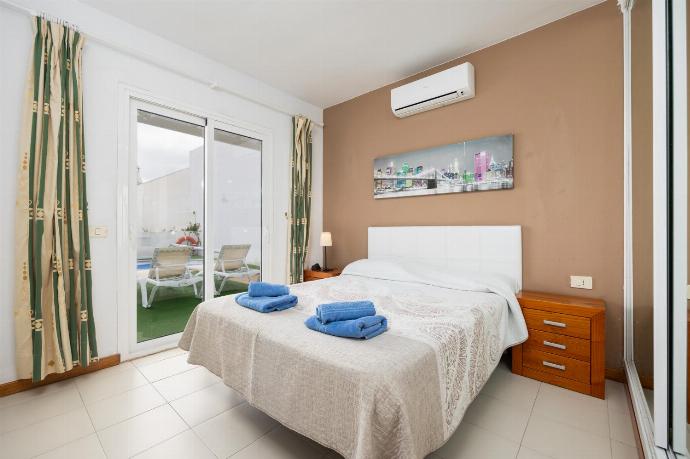 Double bedroom with A/C . - Villa Reyes . (Galería de imágenes) }}
