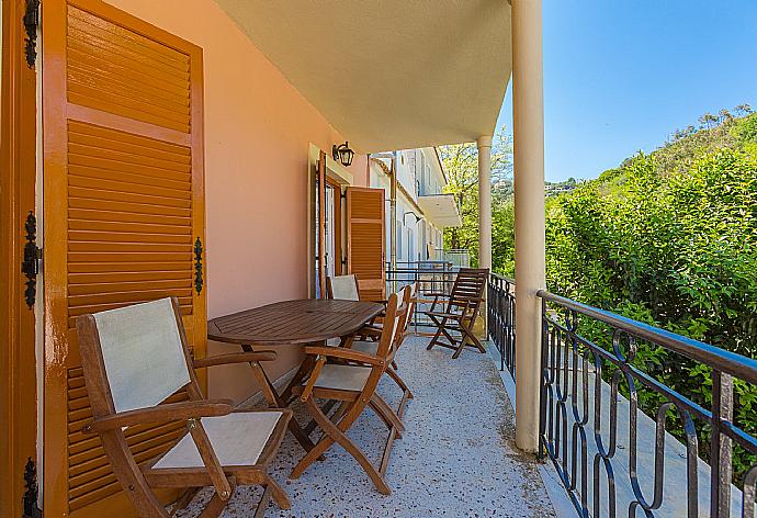 Balcony with outdoor seating . - Anna Apartment . (Photo Gallery) }}