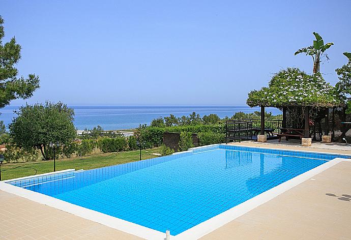 Private pool with terrace and garden area . - Villa Ariadne . (Photo Gallery) }}