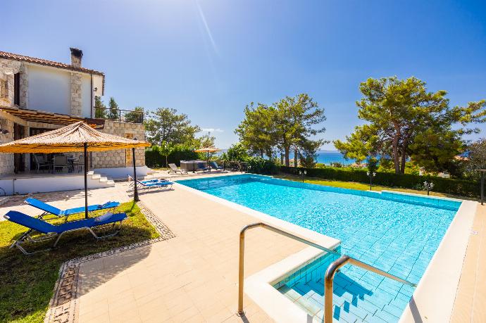 Private pool, terrace, and garden with sea views . - Villa Ariadne . (Photo Gallery) }}