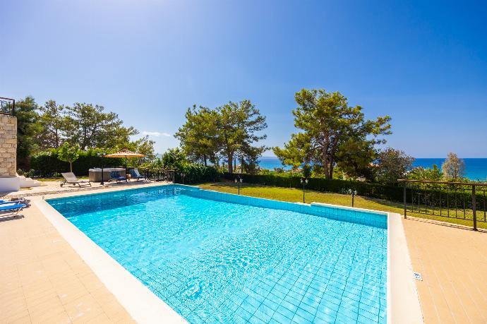 Private pool, terrace, and garden with sea views . - Villa Ariadne . (Photo Gallery) }}