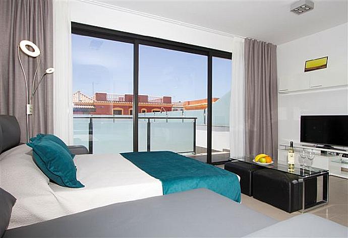 Double bedroom with A/C, en suite bathroom and balcony access . - Villa Dream Dos . (Photo Gallery) }}