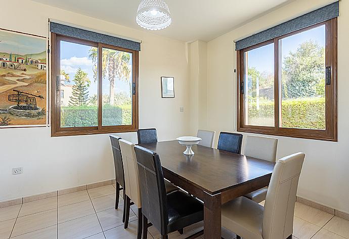 Open-plan living room with sofa, dining areas, kitchen, A/C, WiFi internet, and satellite TV . - Villa Halima Georgios . (Fotogalerie) }}