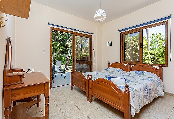 Twin bedroom with A/C and terrace access . - Villa Halima Stefanos . (Photo Gallery) }}