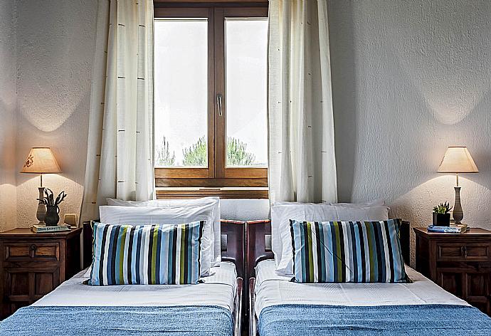 Twin bedroom with A/C and balcony access . - Villa Raches . (Galleria fotografica) }}