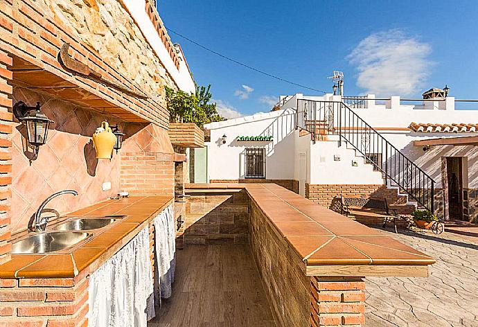 Outdoor kitchenette with BBQ area . - Villa Naiara . (Photo Gallery) }}